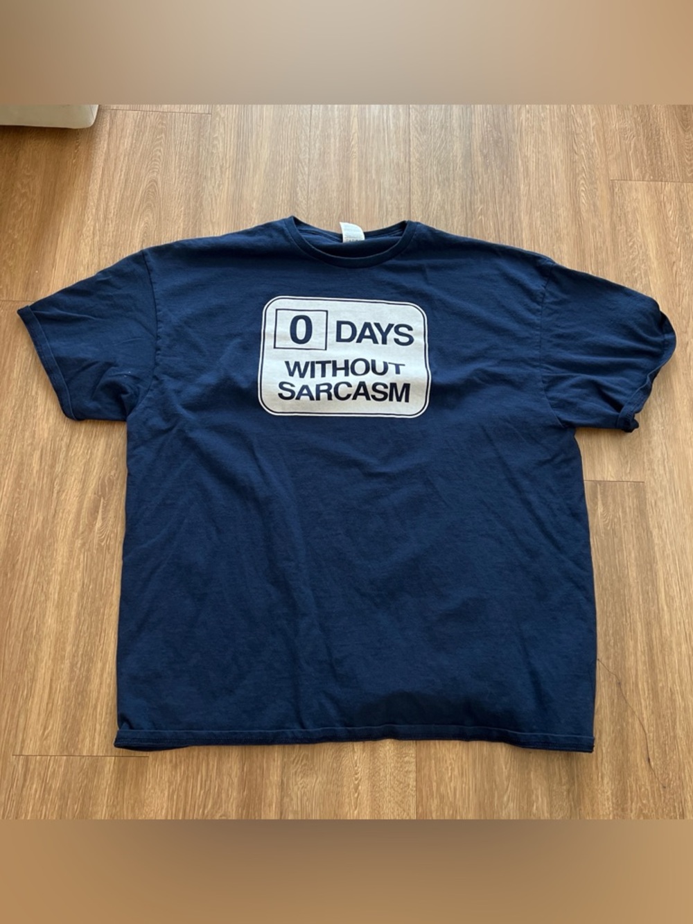Delta Navy Short-Sleeve Tee with White '0 Days Without Sarcasm' Graphic